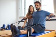 Reformer Pilates involves slow movements that focus on building core strength (Image via Pexels/Kampus Production)